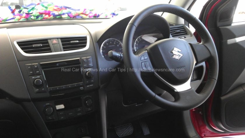 Suzuki Swift 1.4 CBU Dual tones colours on dashboard with digital display for audio and air-con information