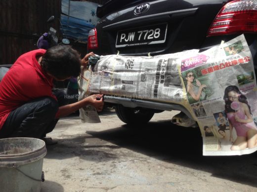 sanding process on car body kit using sandpapers with water 2