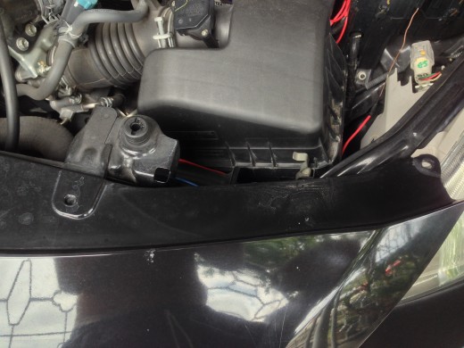 Remove 4 pins at the Toyota Vios Top Bumper