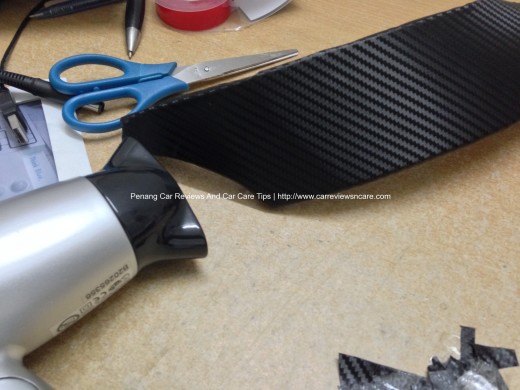 Heating the Toyota Vios Interior Trim with Carbon Fiber Trim using hair dryer 2