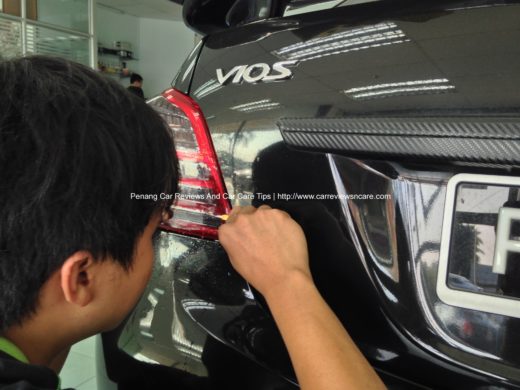 Putting tint film on Toyota Vios tail lamp reverse light compartment