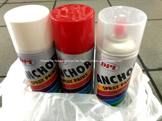 White, red, and lacquer spray cans