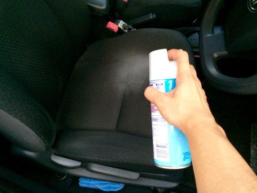 Spray the Lysol Disinfection Spray on the driver seat 2