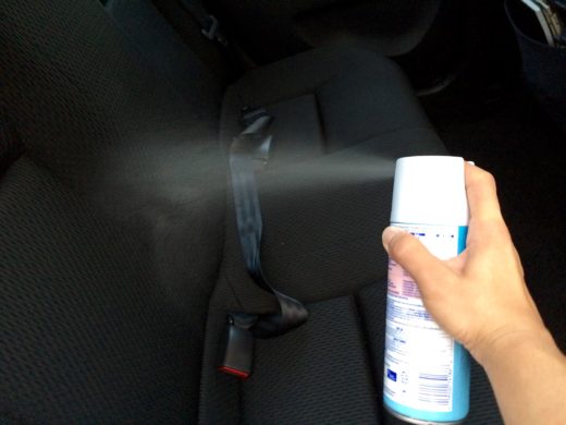 Spray the Lysol Disinfection Spray on the passenger seats