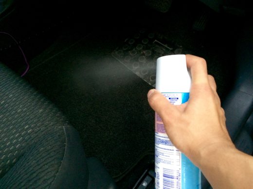 Spray the Lysol Disinfection Spray on the car carpets