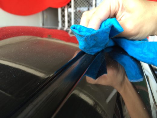 Application of the Armorall Protectant gel on the car roof seal rubber 2