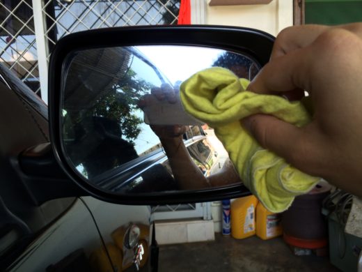 Scrub on the side mirror with cloth and some force 2