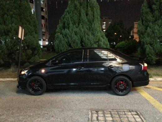 Toyota Vios GT Street with Black TRD Wheels Sideview during Night Time