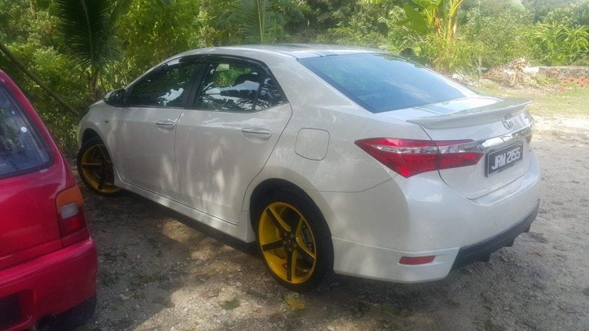 White Toyota Corolla Altis Rear View