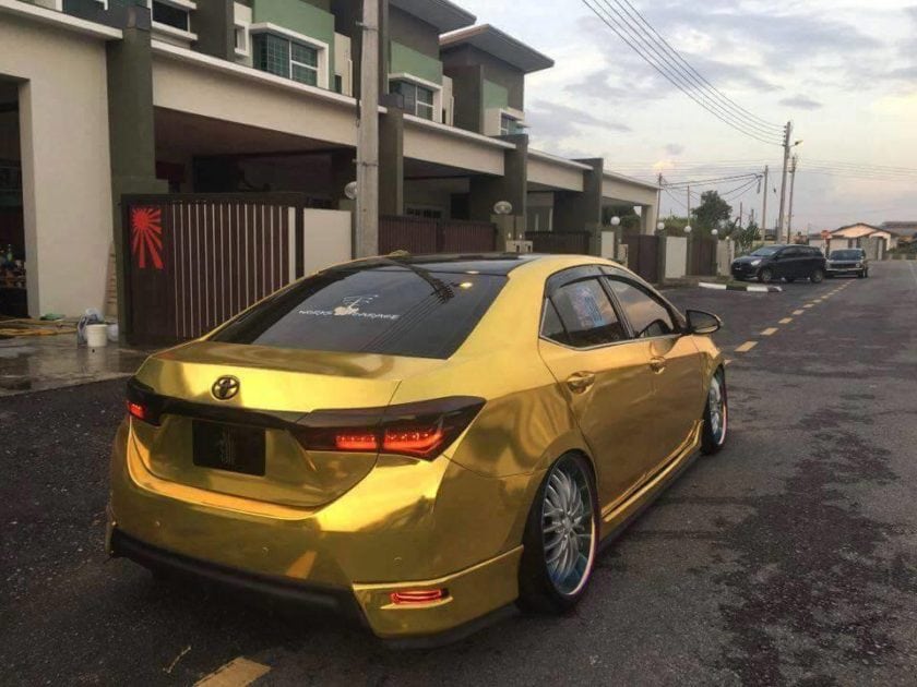 Back view of Gold Toyota Altis